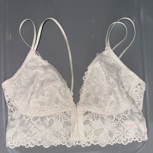 White bralette has clasps in the front part